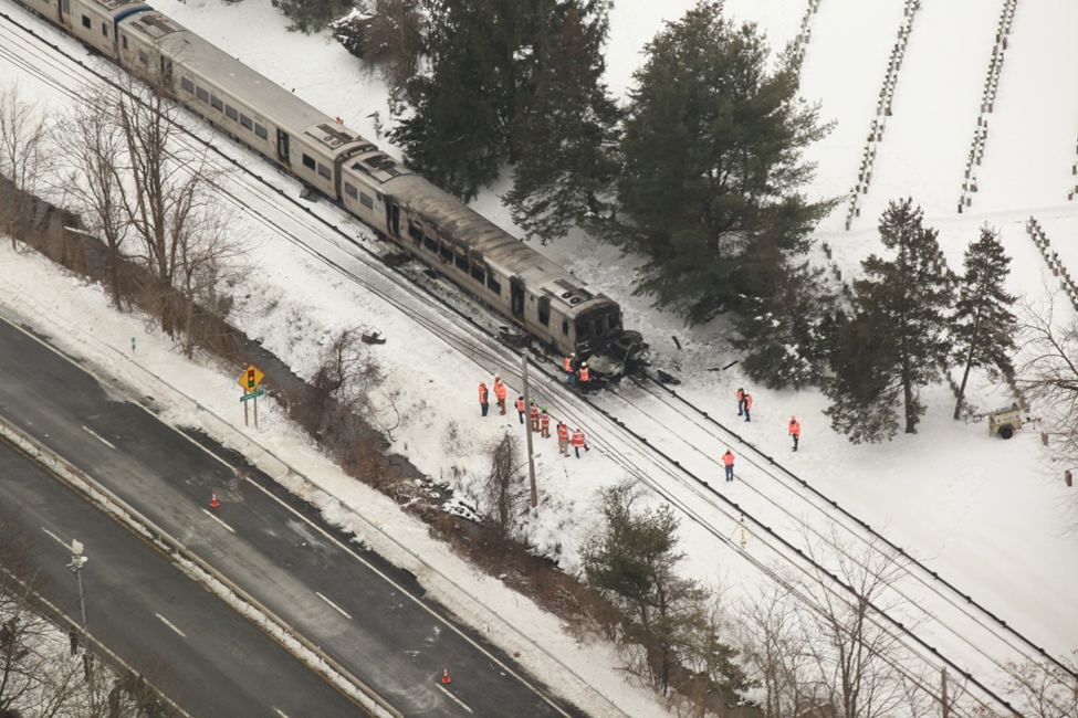 Aerial photograph of Metro North Railroad Train number 659 after striking vehicle. The vehicle is at the front of the train wher