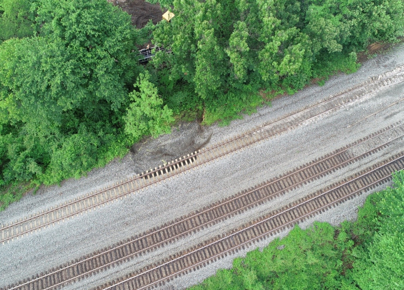 NTSB aerial drone photograph taken after freight cars were removed from main track one.