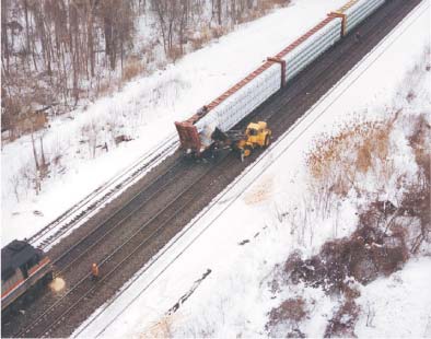Photo of postaccident positions of the end of the CSXT freight train and the lead Amtrak locomotive unit.