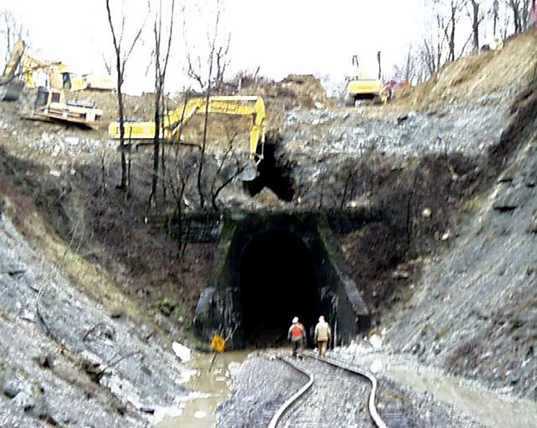 Excavation of Eagle Tunnel No. 3. (Track misalignment caused by derailment.)