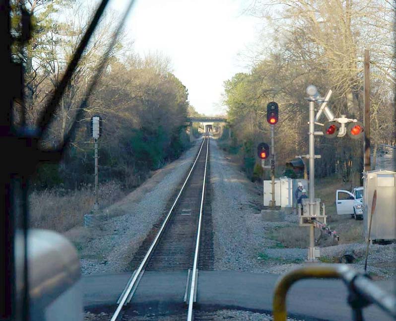 Photo of Eastbound signal at Riverside as seen from a locomotive cab during postaccident sight distance testing.