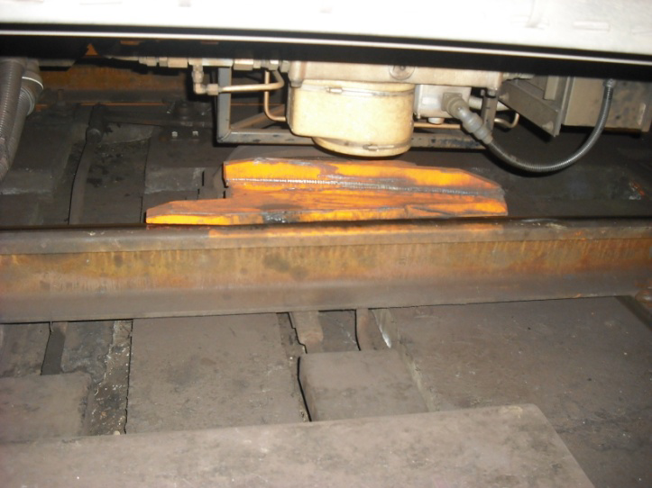 Photo of derail in the normal position for a red signal.