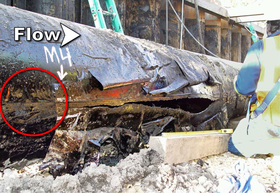 The ruptured segment of Line 6B in the trench following the July 25, 2010, rupture.