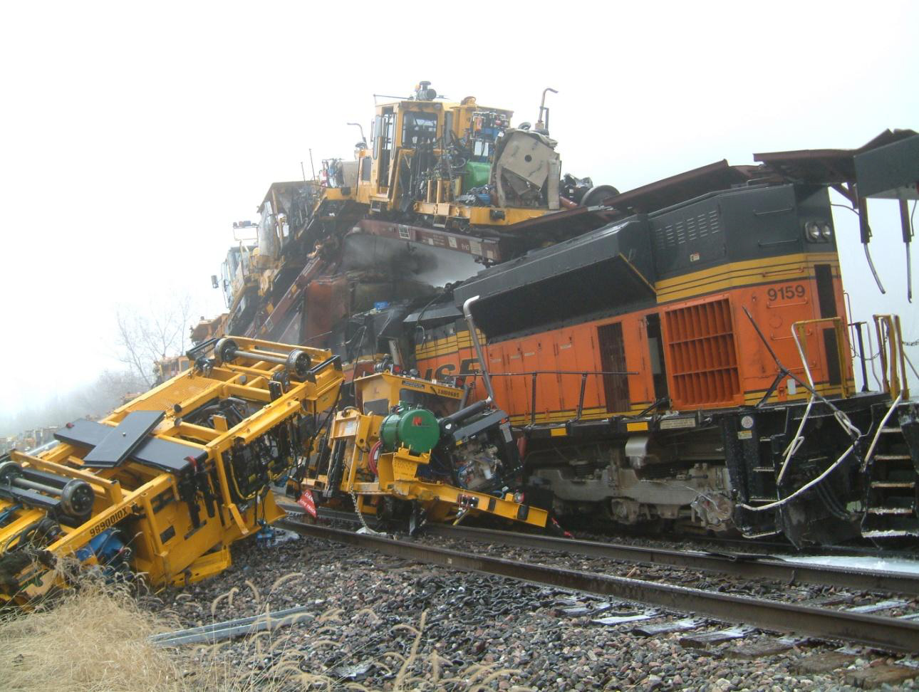 Photo of the wreckage including lead locomotive of striking train.