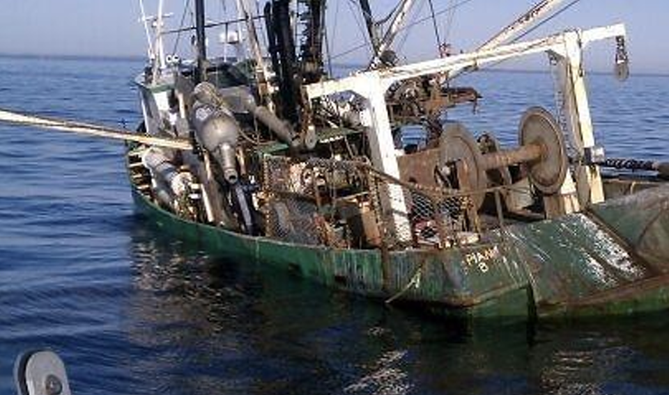 The Plan B listing to port before sinking. (Photo by Coast Guard)