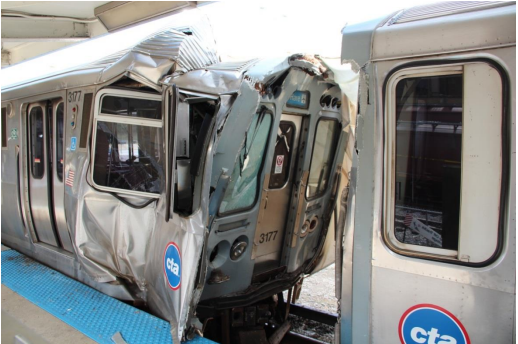 Crumpled lead car of passenger train 110 and minimally damaged striking car.