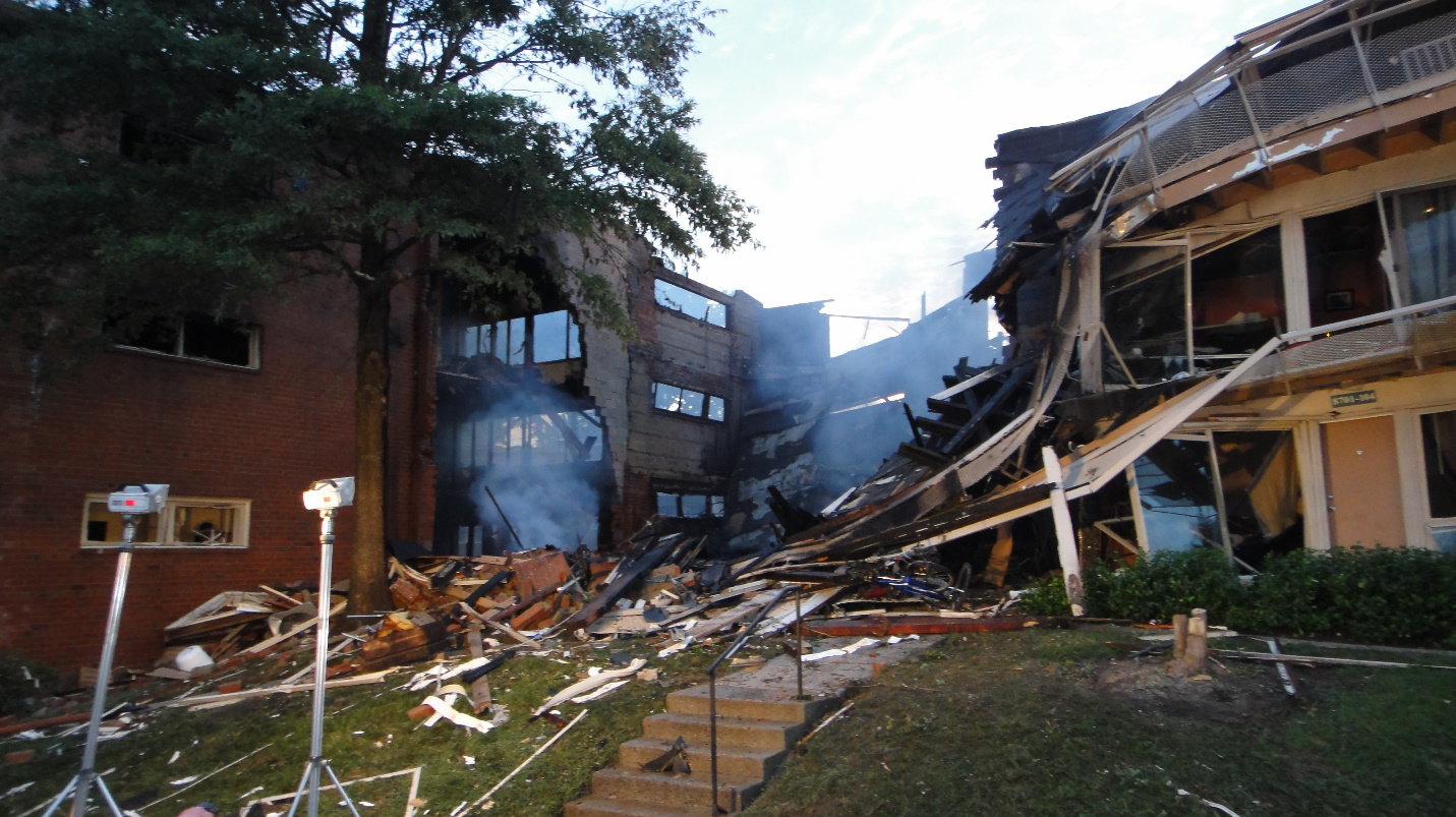 Photo of buildings 8701 (right-center) and 8703 (left) Arliss Street, Silver Spring, Maryland, after the explosion and fire.