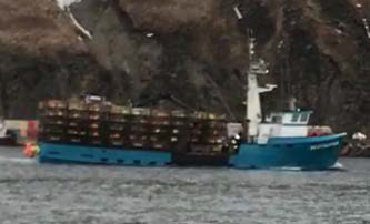A screenshot from video of the Destination as it arrived in Dutch Harbor carrying 200 crab pots.