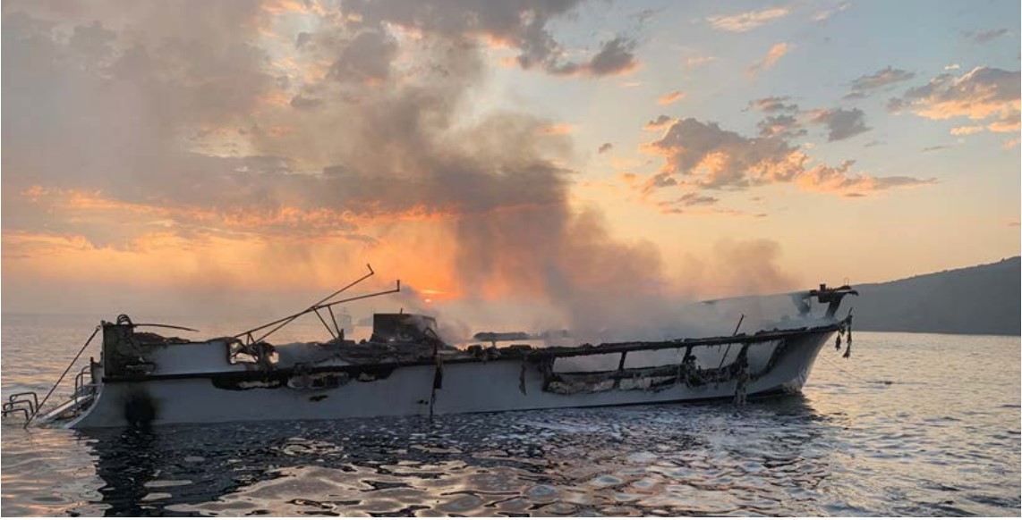 Photo of Conception’s burned hull at dawn on Sept. 2, 2019, prior to sinking.