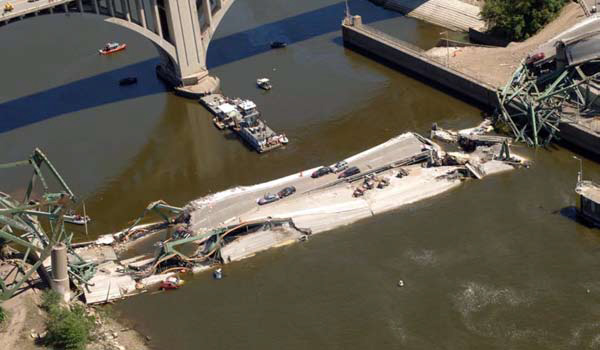 Collapsed bridge center section, looking southeast.