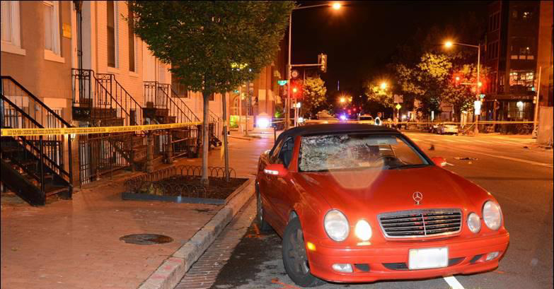 Photo of crash car parked on 9th Street NW after collision.