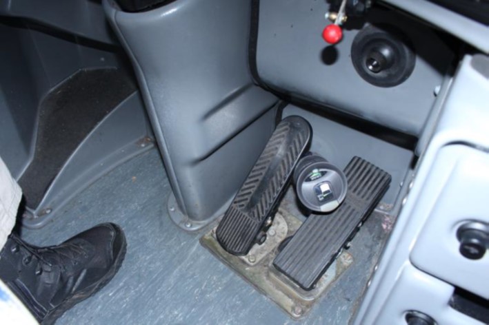 Photo of Pedal obstruction test using exemplar motorcoach and metal thermos.