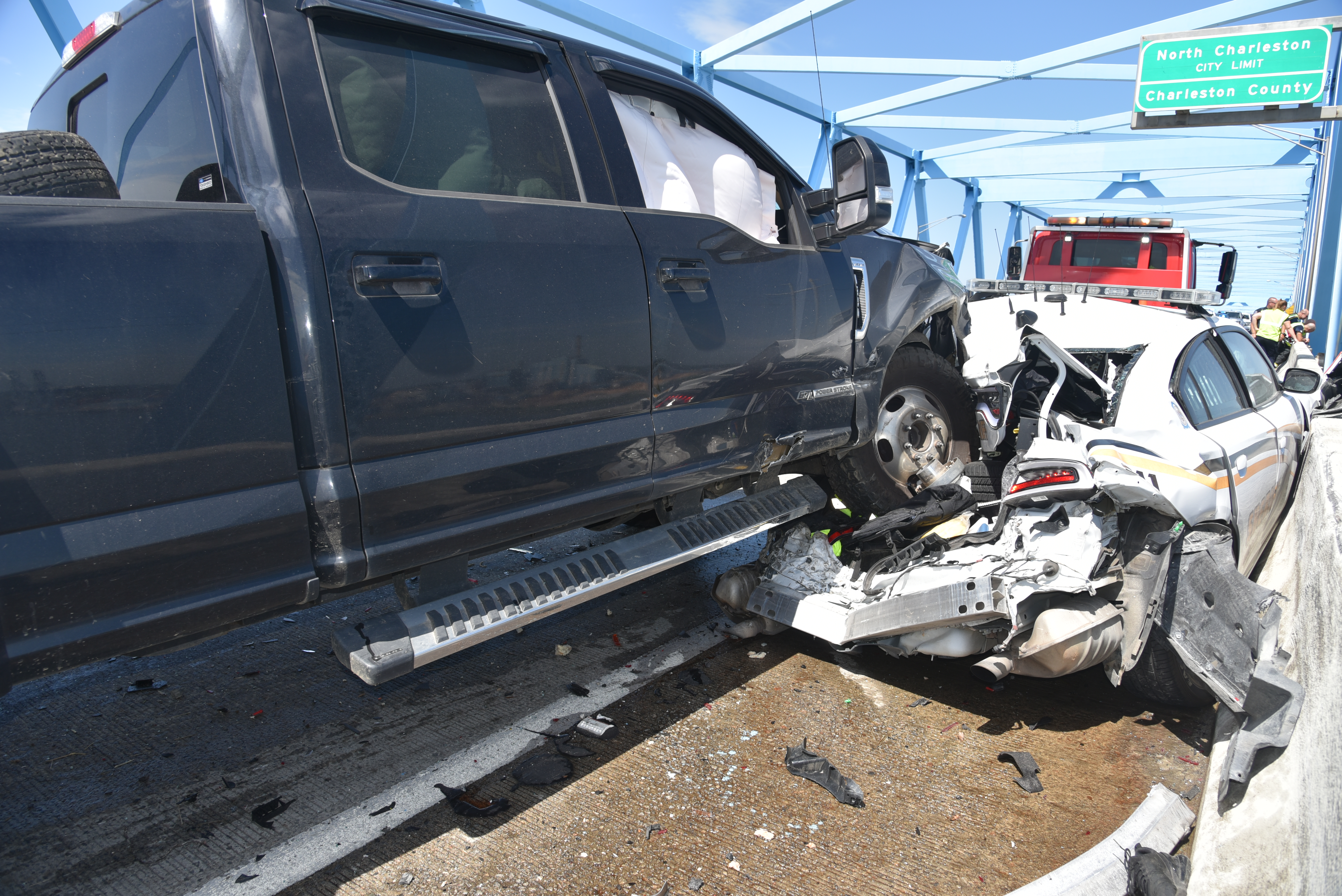  Pickup truck at final rest, with the patrol car and rear of tow truck.