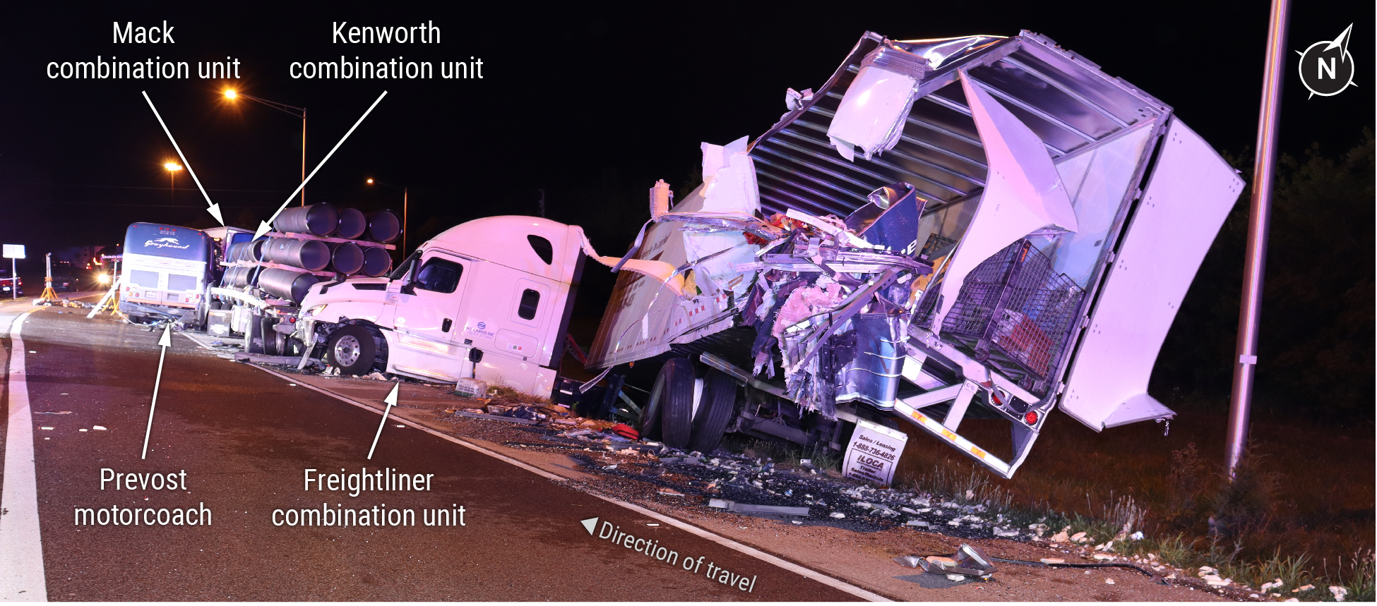 Crash scene photograph showing the motorcoach and three tractor-trailer combination vehicles