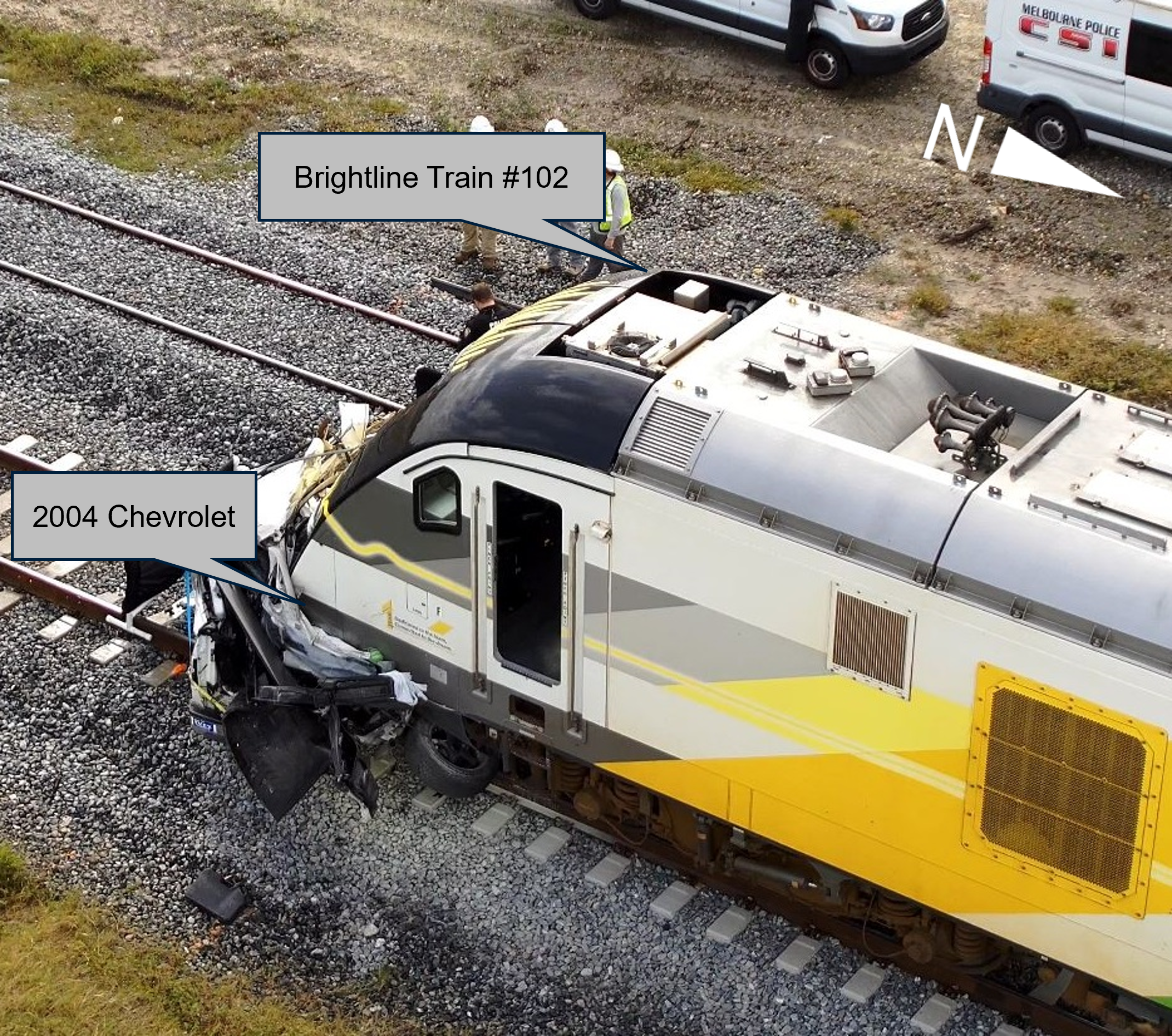 Photograph of the January 12, 2024, crash showing the pickup truck and passenger train at final rest. 