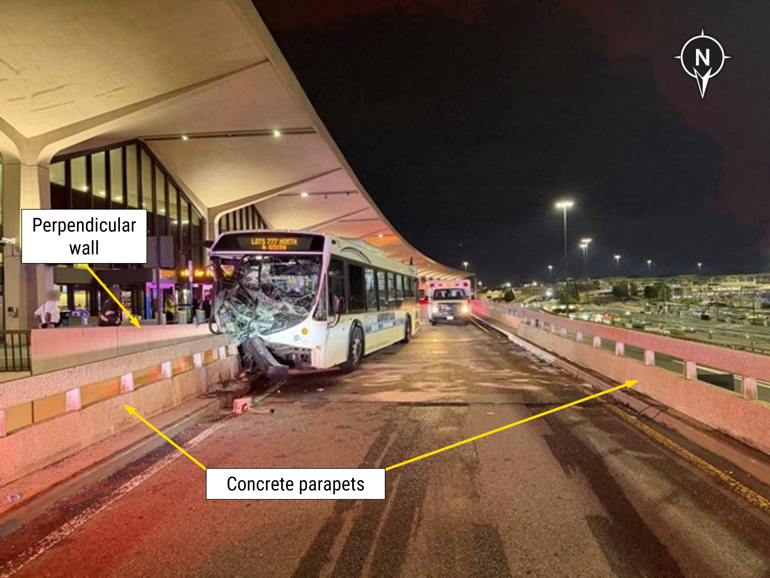 Photograph of crash scene showing final rest of the bus. 