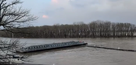 Barge MPC 1056 adrift in the Ohio River and contacting the Nu Plaza Yacht Club dock on the day of the casualty.