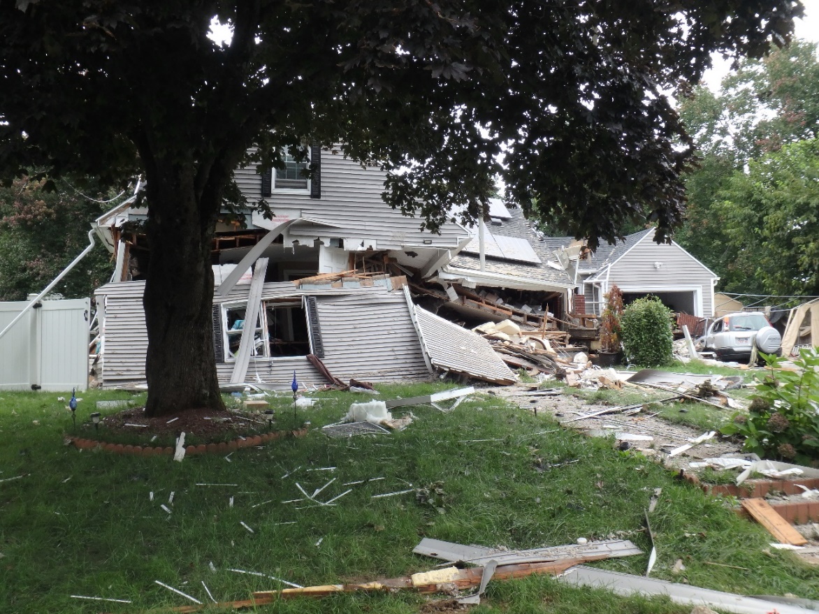 Photo of the remnants of house where the fatality and two severe injuries occurred.