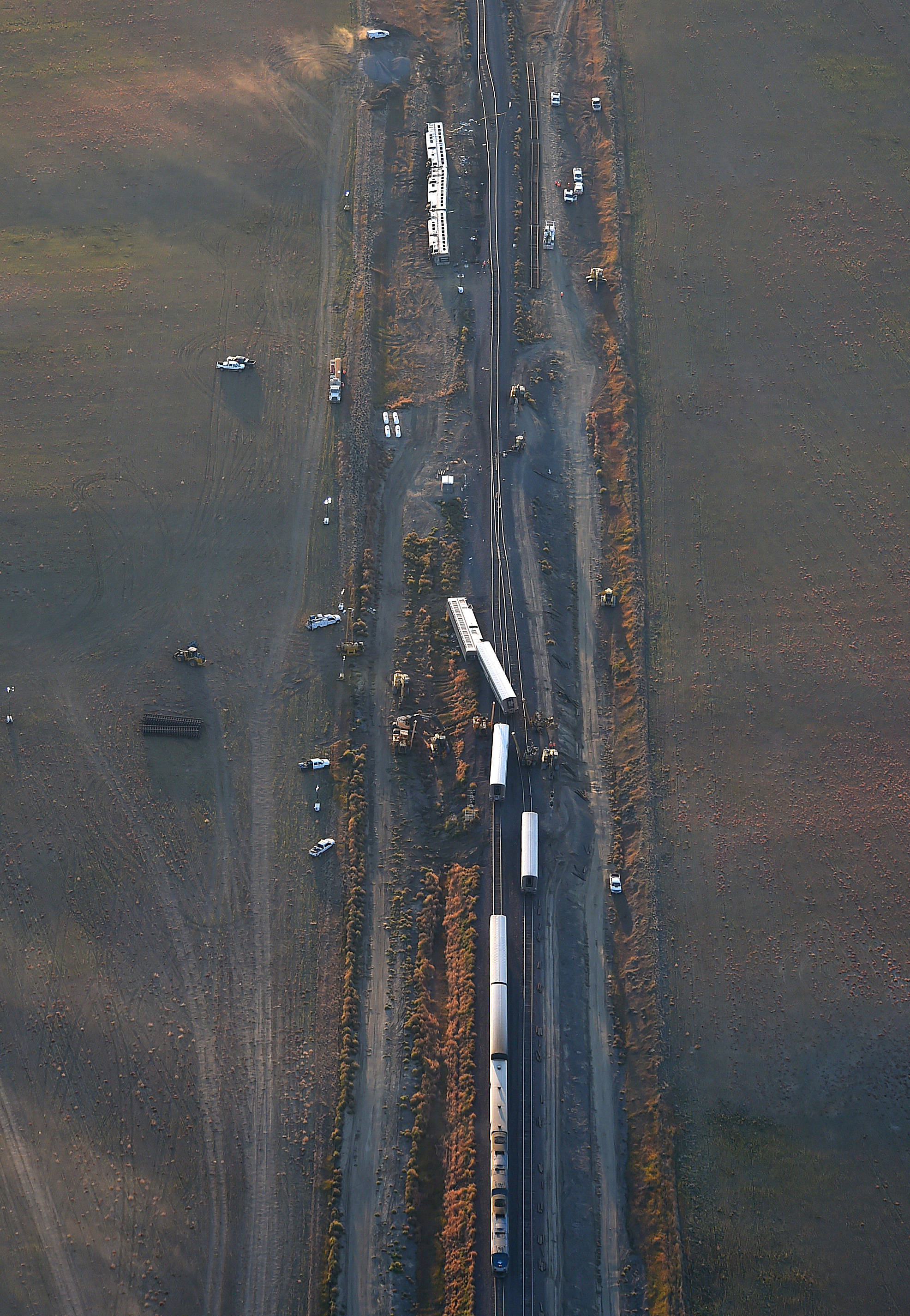(This photo taken on Sept. 26, 2021, shows the aerial view of the accident scene, derailed train, and debris. Photo courtesy of 