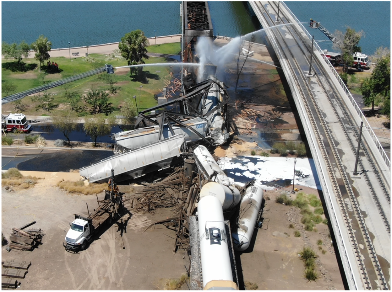 This aerial photo taken on June 29, 2020, shows the derailed train, damaged trestle, debris, and fire suppression efforts.