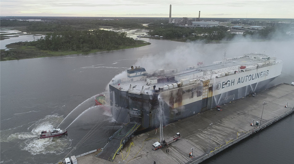 Firefighters conduct exterior boundary cooling on the Höegh Xiamen on June 5, 2021, the day after the fire was discovered.