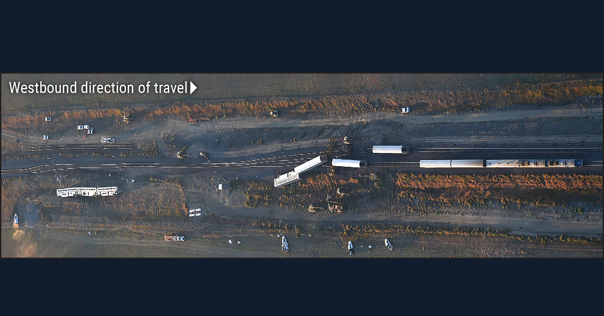 Aerial view of the accident scene, derailed train and debris
