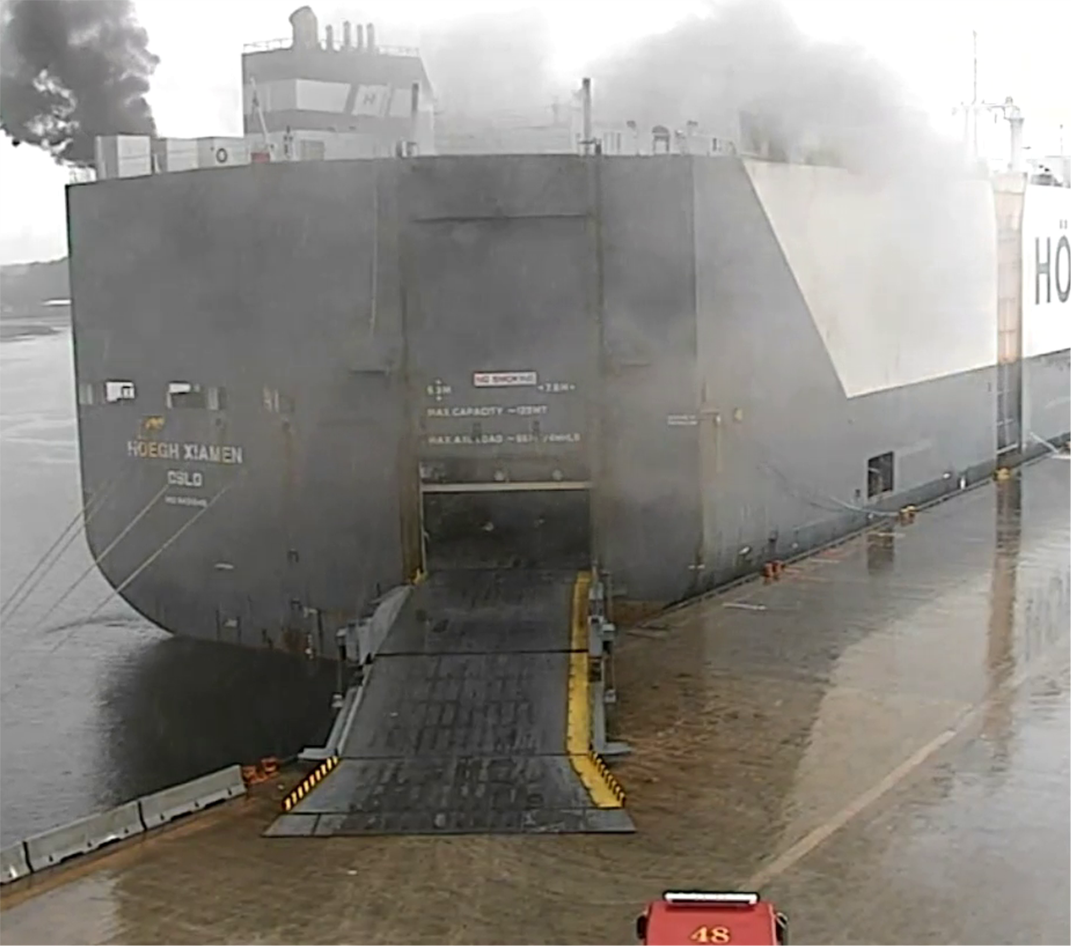 Smoke coming from the aft cargo deck ventilation housing exhausts of the Höegh Xiamen