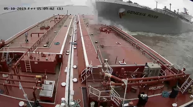 screen capture from wheelhouse video on board the towing vessel Voyager shows the moment when the LPG tanker struck the barge.